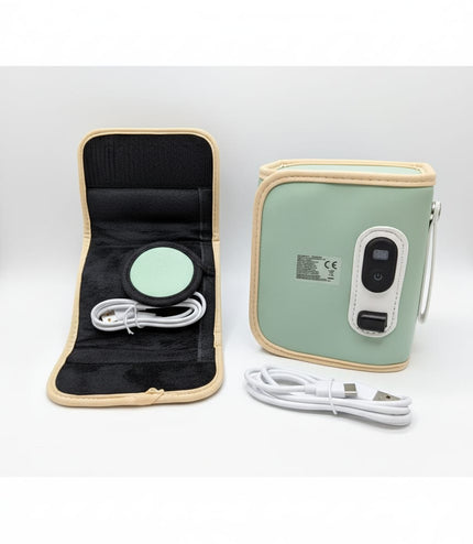Close-up view of portable baby bottle warmer showing heating mechanism