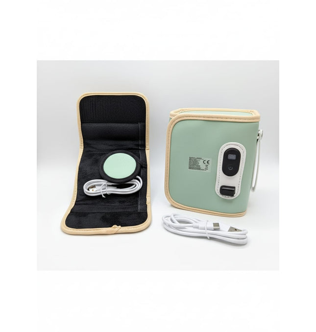 Close-up view of portable baby bottle warmer showing heating mechanism
