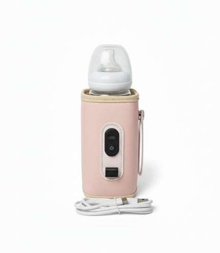 Pink USB-powered baby bottle warmer showing compact portable design